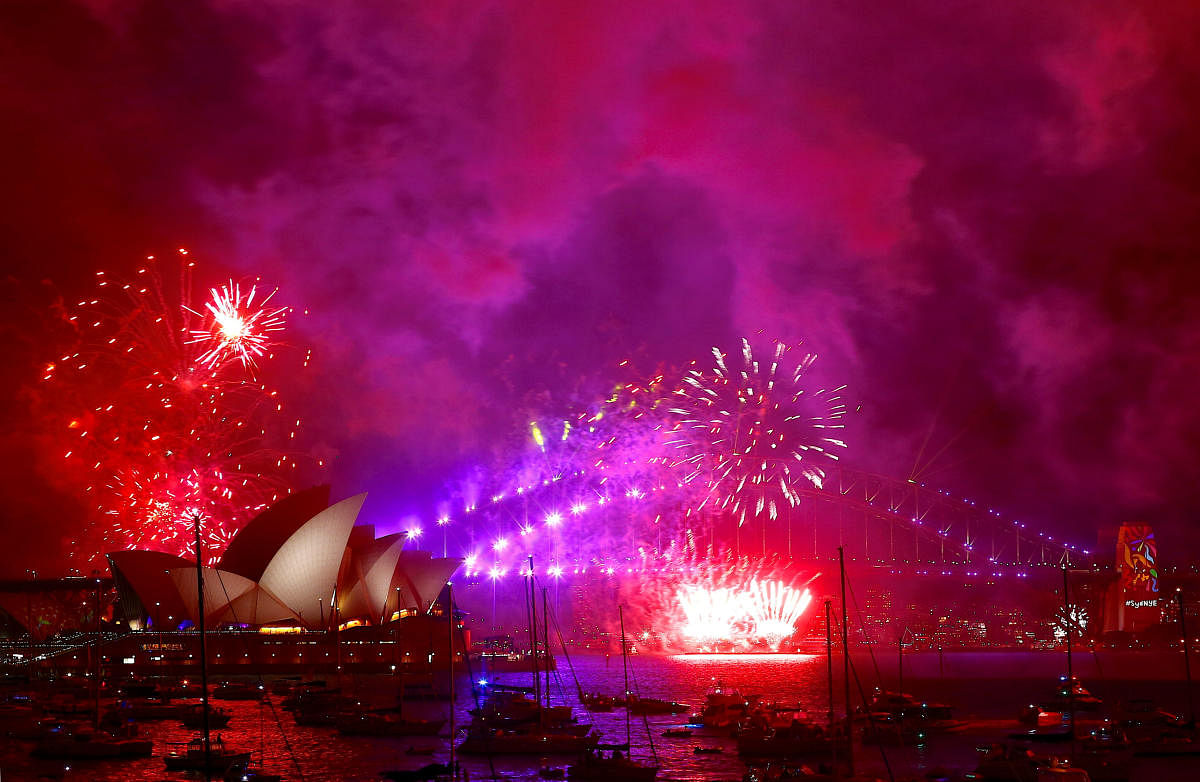 Fireworks light up the Sydney Harbour Bridge and Sydney Opera House as part of new year celebrations on Sydney Harbour, Australia. Reuters