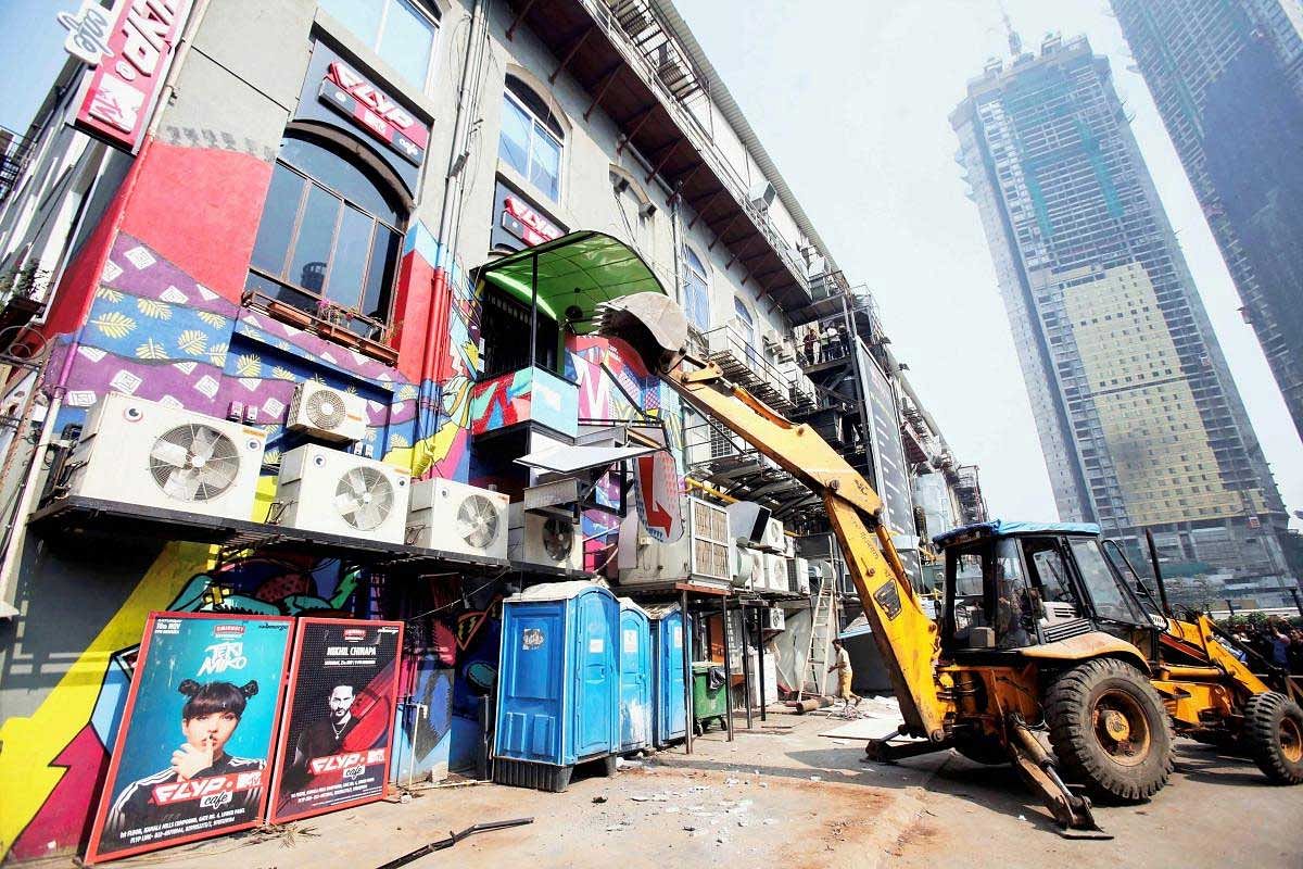 Illegal constructions and alterations at over 355 establishments were razed in the city on Sunday as the civic body continued to demolish structures at hotels and restaurants, after a blaze at an upscale pub claimed 14 lives on December 29. PTI file photo