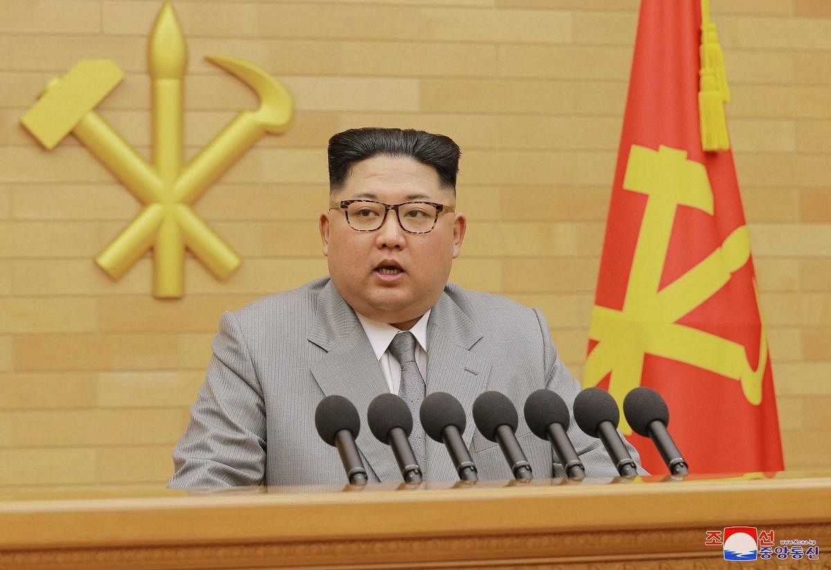 In this photo provided by the North Korean government, North Korean leader Kim Jong Un delivers his New Year's speech at an undisclosed place in North Korea Monday, Jan. 1, 2018. Kim said Monday the United States should be aware that his country's nuclear forces are now a reality, not a threat. Independent journalists were not given access to cover the event depicted in this image distributed by the North Korean government. The content of this image is as provided and cannot be independently verified. Korean language watermark on image as provided by source reads: