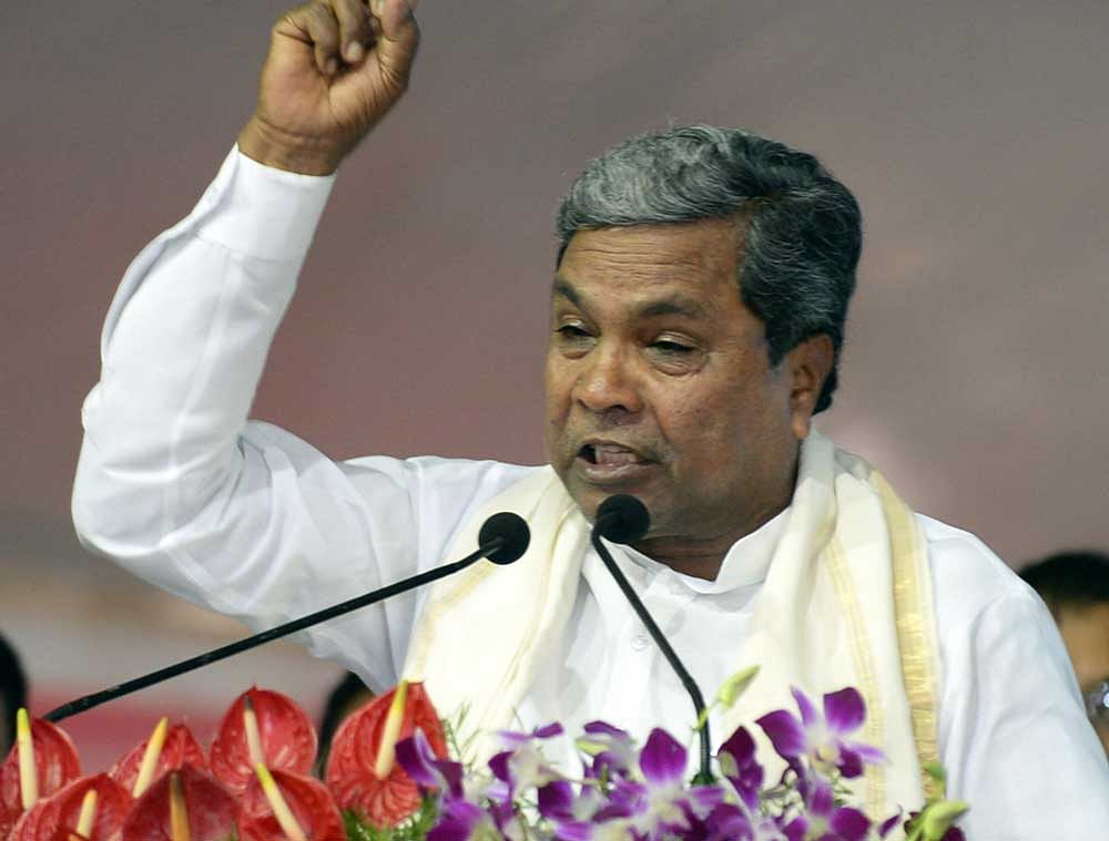 Christmas was round the corner when Chief Minister Siddaramaiah went around the state playing Santa, doling out gifts in the form of developmental works.  DH file photo