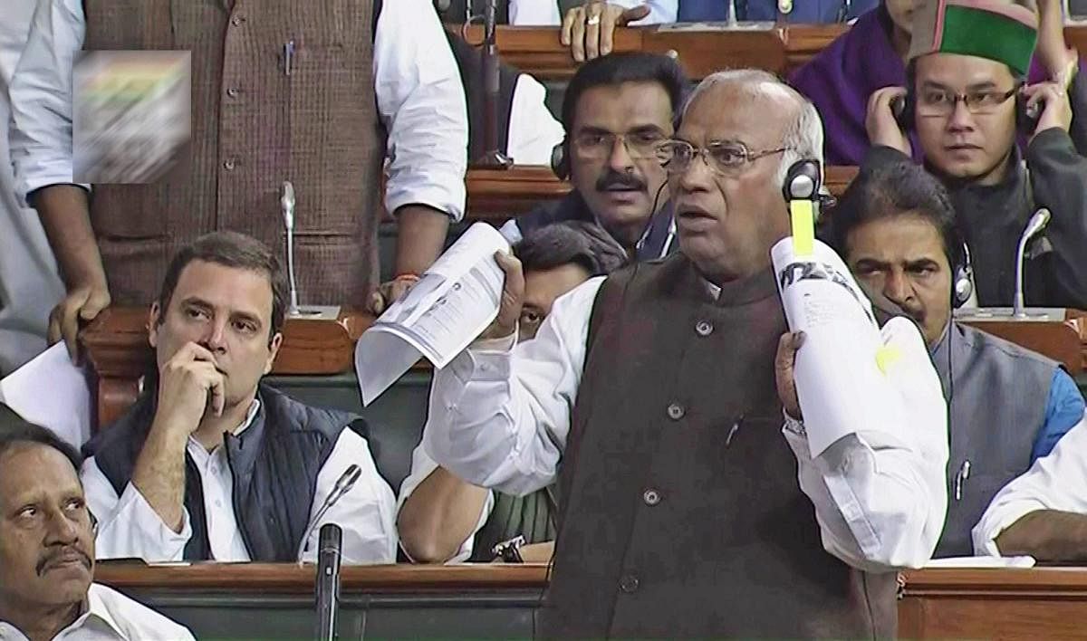 Congress leader Mallikarjun Kharge speaks in the Lok Sabha in New Delhi on Wednesday, during the winter session of Parliament. PTI Photo