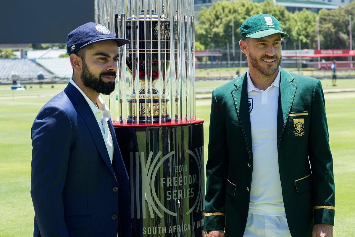 ALL SET: India's captain Virat Kohli (left) and South Africa's captain Faf du Plessis with the 2018 Freedom Series trophy in Cape Town on Wednesday. AFP