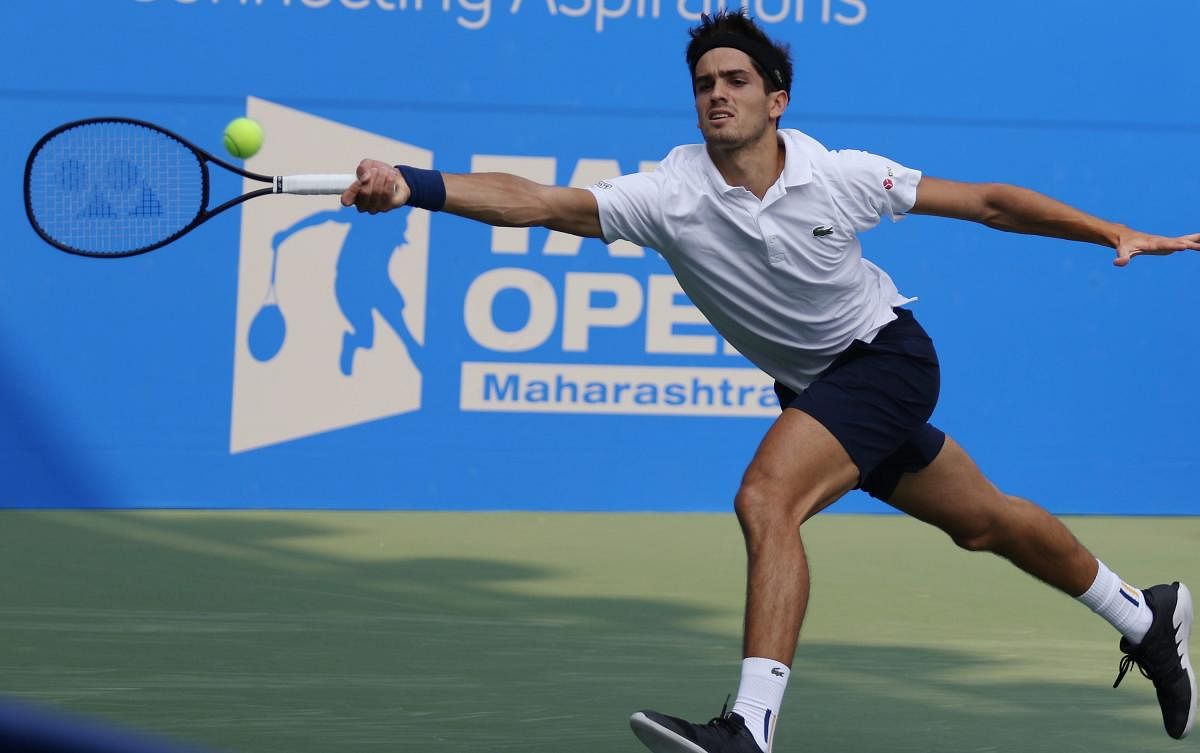 Pune: France's Pierre-Hugues Herbert in action against India's Yuki Bhambri during their second round match at Tata Open Maharashtra in Pune on Wednesday. PTI Photo (PTI1_3_2018_000172A)