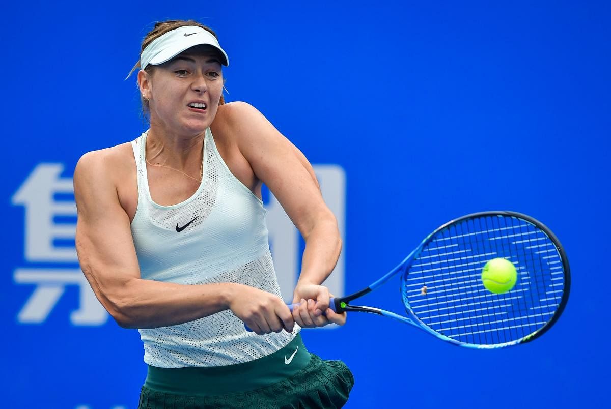 Maria Sharapova of Russia in action against Zarina Diyas of Kazakhstan during their quarterfinal match on Thursday. AFP