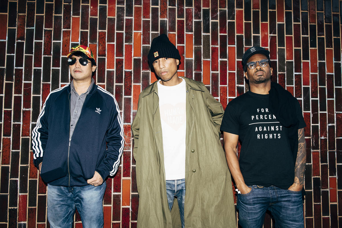 Pharrell Williams, centre, with his N.E.R.D. collaborators, Chad Hugo, left, and Shae Haley, in Los Angeles, USA.