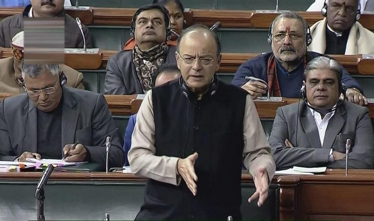 Finance Minister Arun Jaitley speaks in the Lok Sabha on the last day of the Parliament winter session in New Delhi on Friday. PTI Photo.