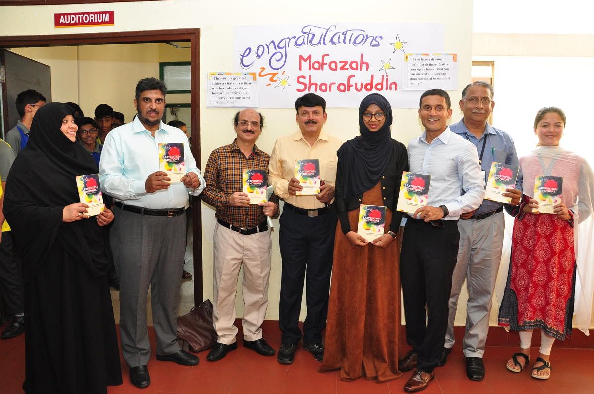 Dignitaries release 'Labyrinths of Emotions' at Yenepoya School in Mangaluru.