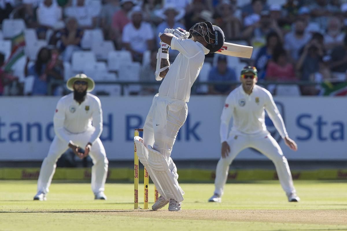 Poor shot: India's Shikhar Dhawan miscues a pull to get out cheaply on the first day of the first Test against South Africa on Friday. AP/ PTI