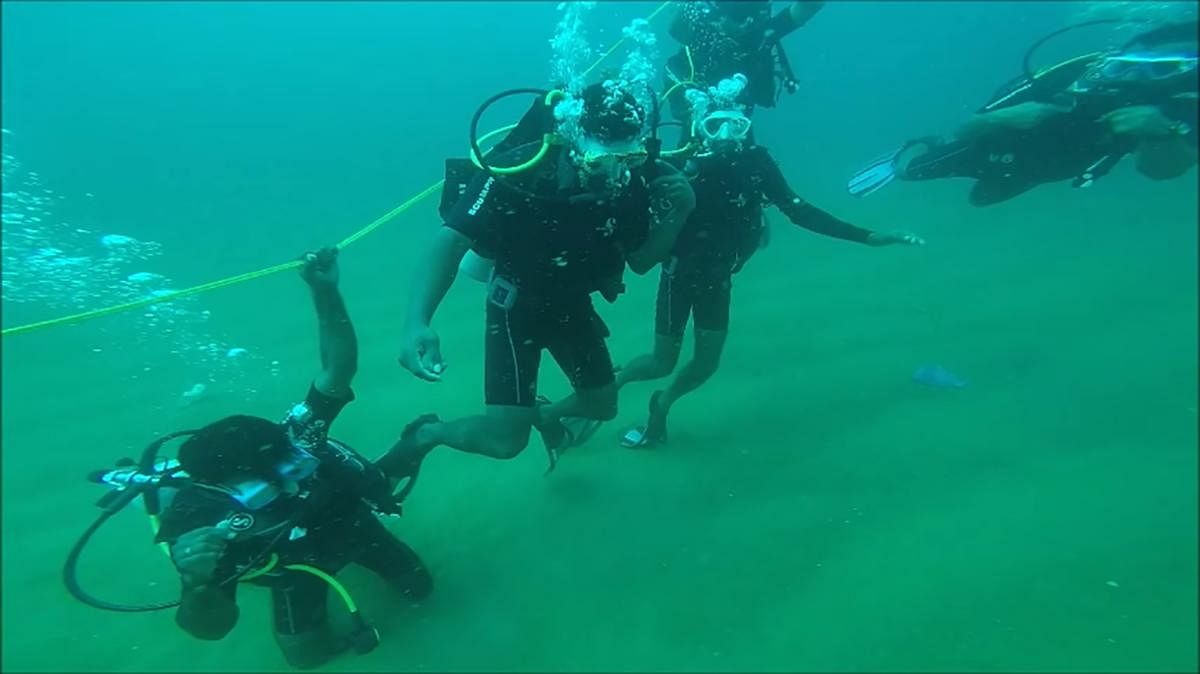 Participants undergo scuba diving training in the first phase of the programme.