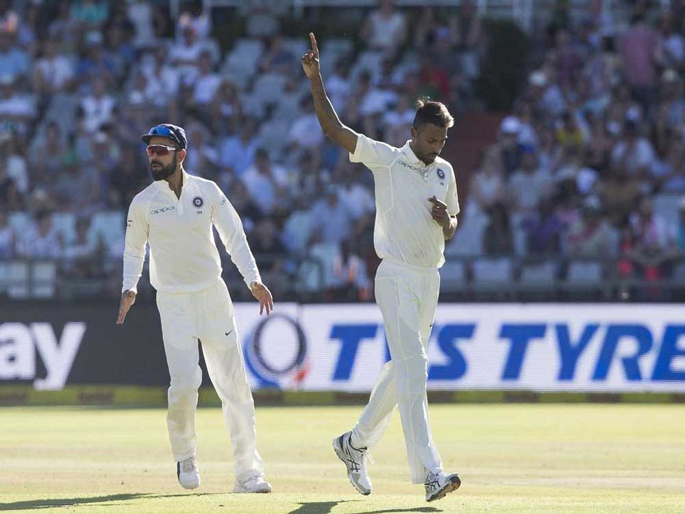 Indian bowler Hardik Pandya and Virat Kohli, AP/PTI photo