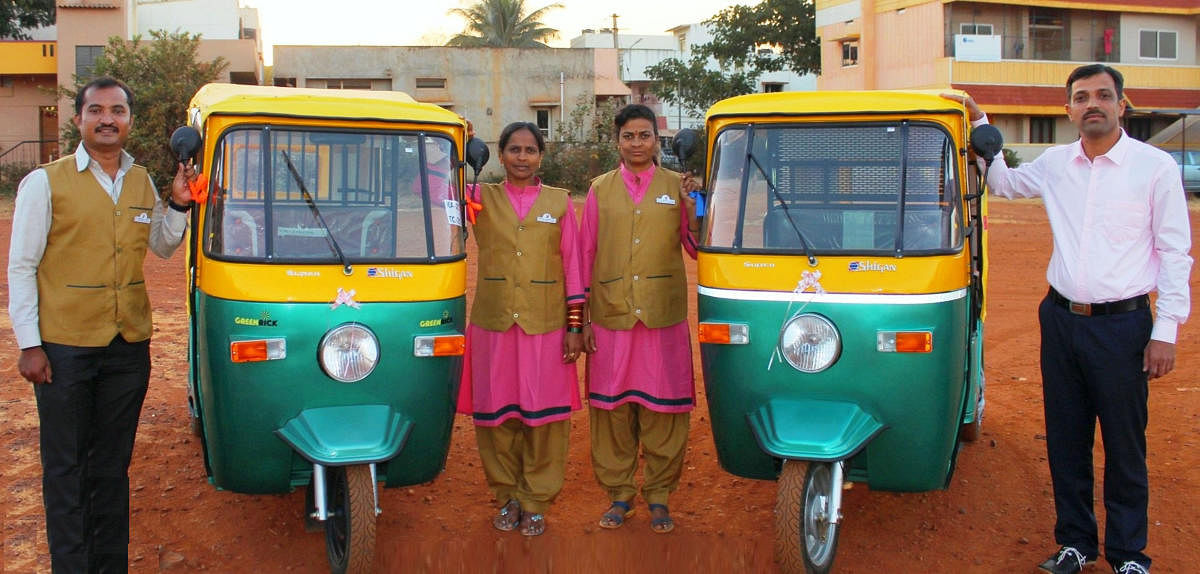 Prakruti Auto proprietor Somashekhar Betageri, auto drivers Samshad Basti, Manjula Hiremath and Prakruti Auto mentor Santosh Nargund with 'Nimma PA' autorickshaws launched in Hubballi on Sunday.