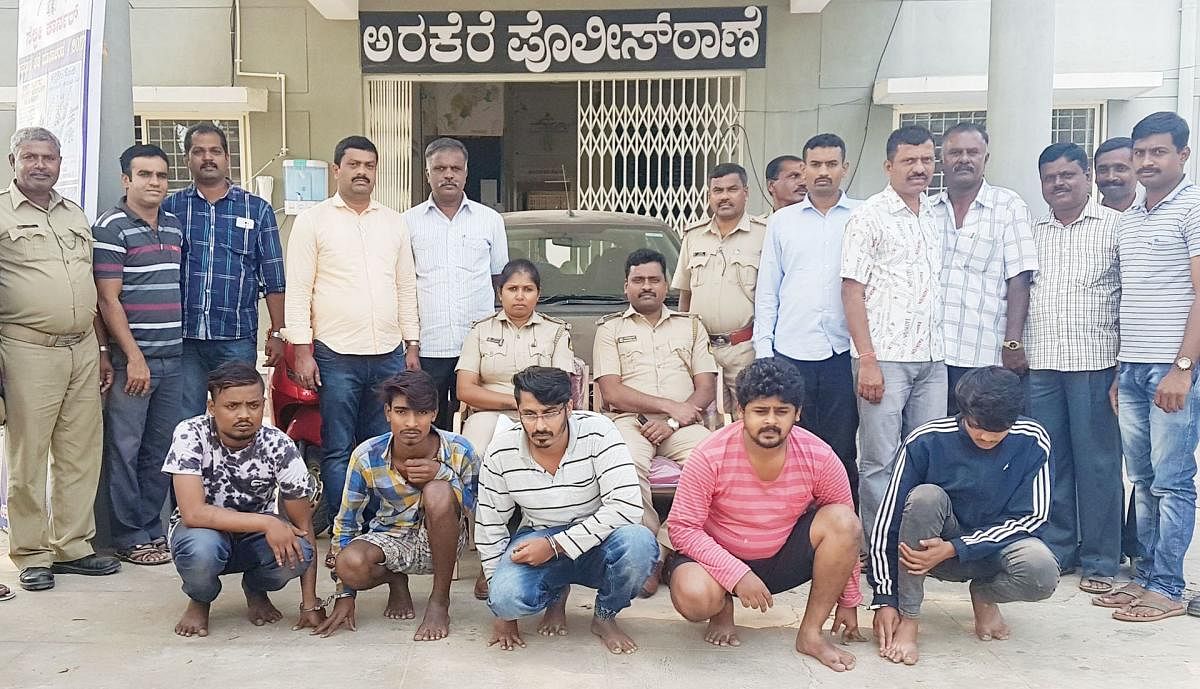 History-sheeters seen with Arakere Police, in Srirangapatna taluk, in Mandya district, on Sunday.