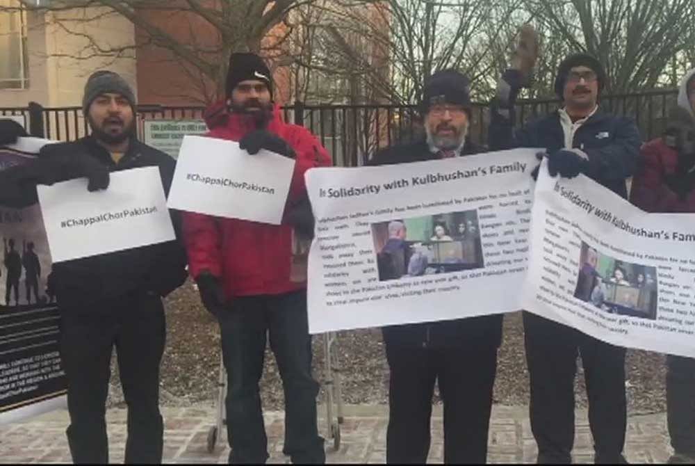 Braving freezing cold, the protesters also brought along sandals to give them to the Pakistani embassy officials. Image courtesy: @ANI Twitter