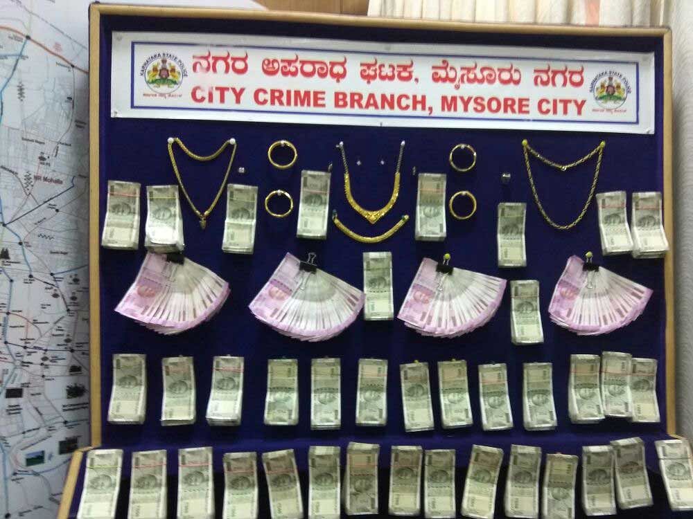 The Central Crime Branch police raided and recovered Rs 23 lakh worth cash and Rs 6 lakh worth gold ornaments from the house of a copper merchant  who had stolen cash and gold jewelry, here in Mysuru. DH file photo