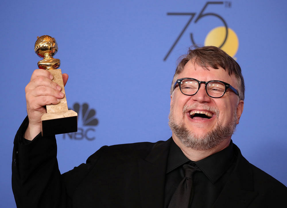 Guillermo del Toro poses backstage with the award for Best Director - Motion Picture for 'The Shape of Water'. Reuters photo.