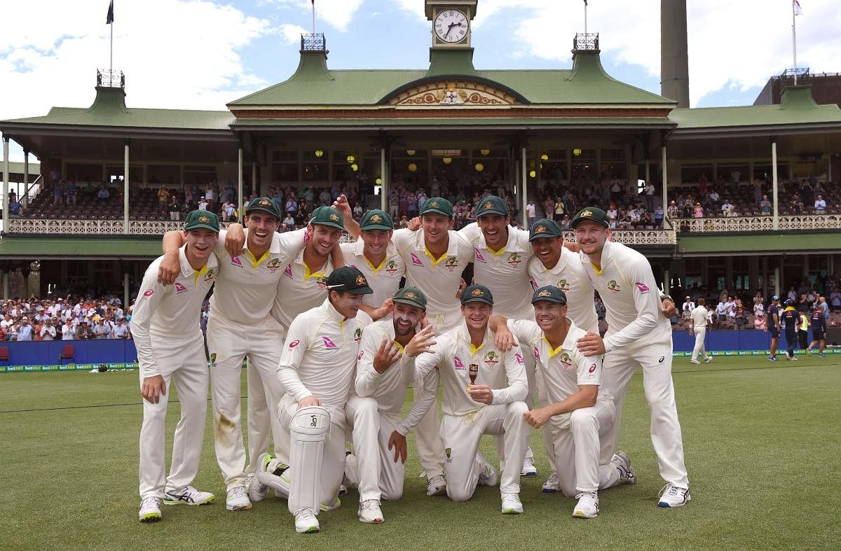DOMINANT SHOW The Australian side celebrate after retaining the Ashes with a 4-0 thumping of England. Steve Smith's men won the fifth Test by an innings and 123 runs on Monday. AFP