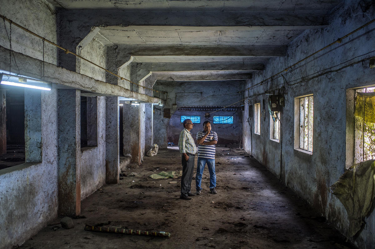 Dilip and Manish Patel at their empty factory, which they had to sell after the rollout of Prime Minister Narendra Modi's goods and services tax, in Surat, India, Nov. 1, 2017. Just about all economists agree that two of Modi's biggest policy gambles - abruptly voiding most of the nation's currency and then, less than a year later, imposing a sweeping new sales tax - have slowed India's meteoric growth.