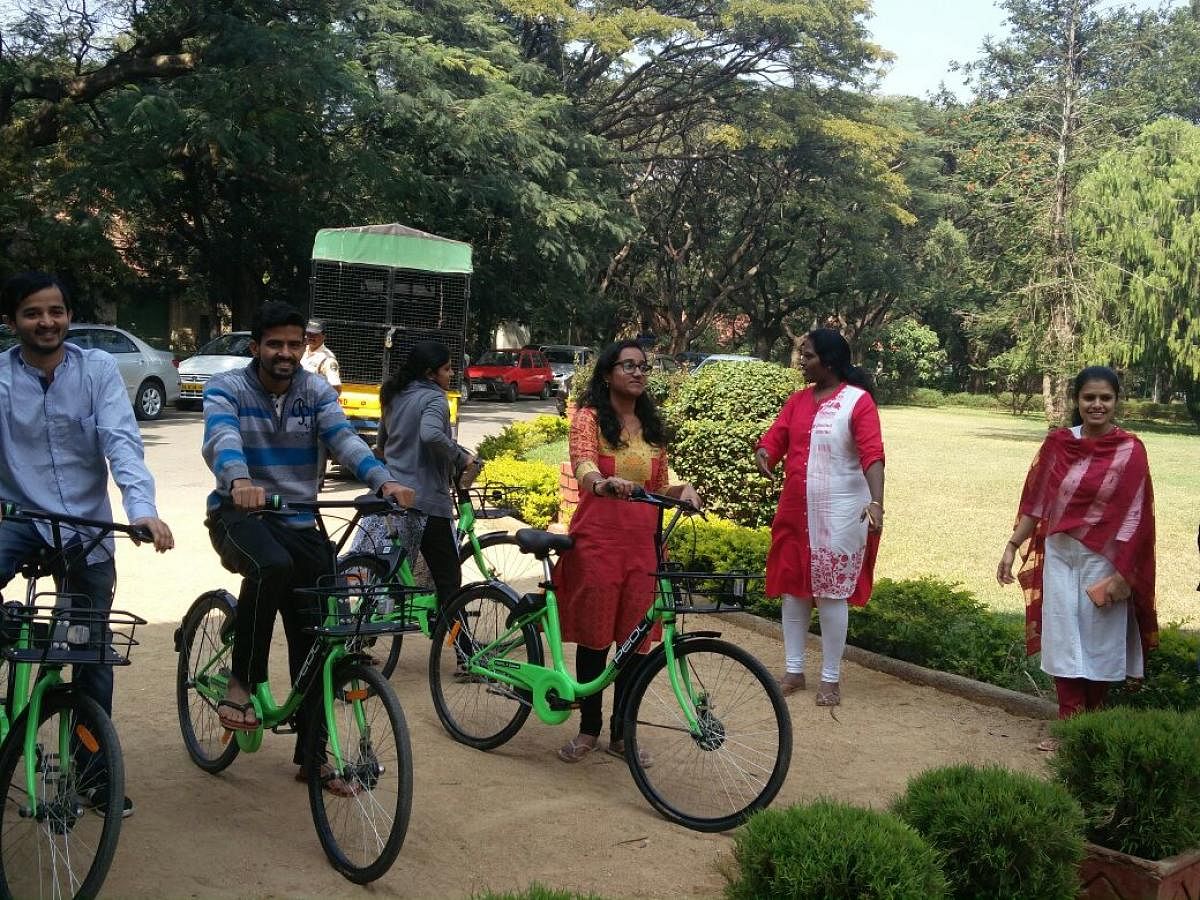 Indian Institute of Science (IISc) students avail Zoomcar's bicycle sharing service PEDL, which is launched in the campus on Thursday.