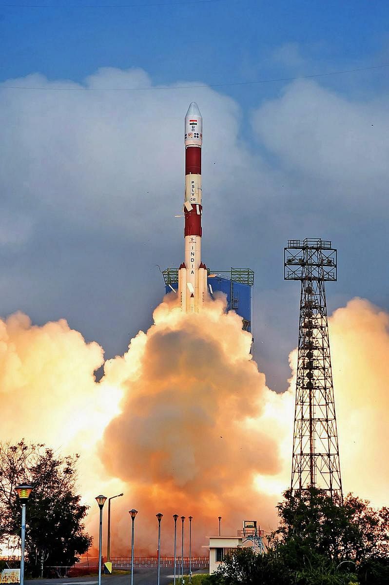 PSLV-C40 carrying Cartosat series along with 30 other satellites lifts off from first launch pad at Sriharikota, on Friday. The lift-off marks 100th launch by ISRO.