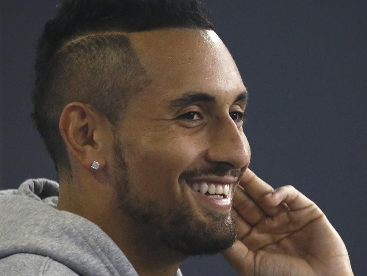 Nick Kyrgios of Australia reacts during a news conference ahead of the Australian Open tennis tournament. REUTERS/Thomas Peter