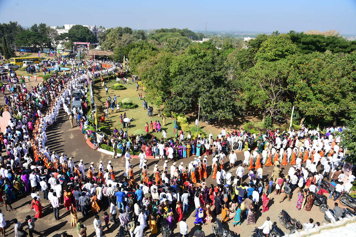 Brides and Grooms take part in procession during mass wedding ceremony, as part of Suttur Jathra Mahothsava, at Suttur, Nanjangudu Taluk, Mysuru District on Sunday January 14, 2018. - PHOTO / DH PV PHOTOS