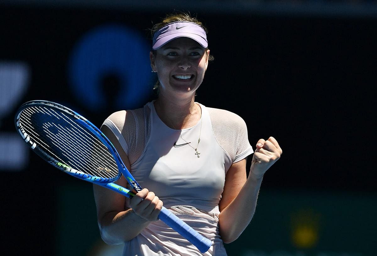 Sharapova happy to be back in old routine