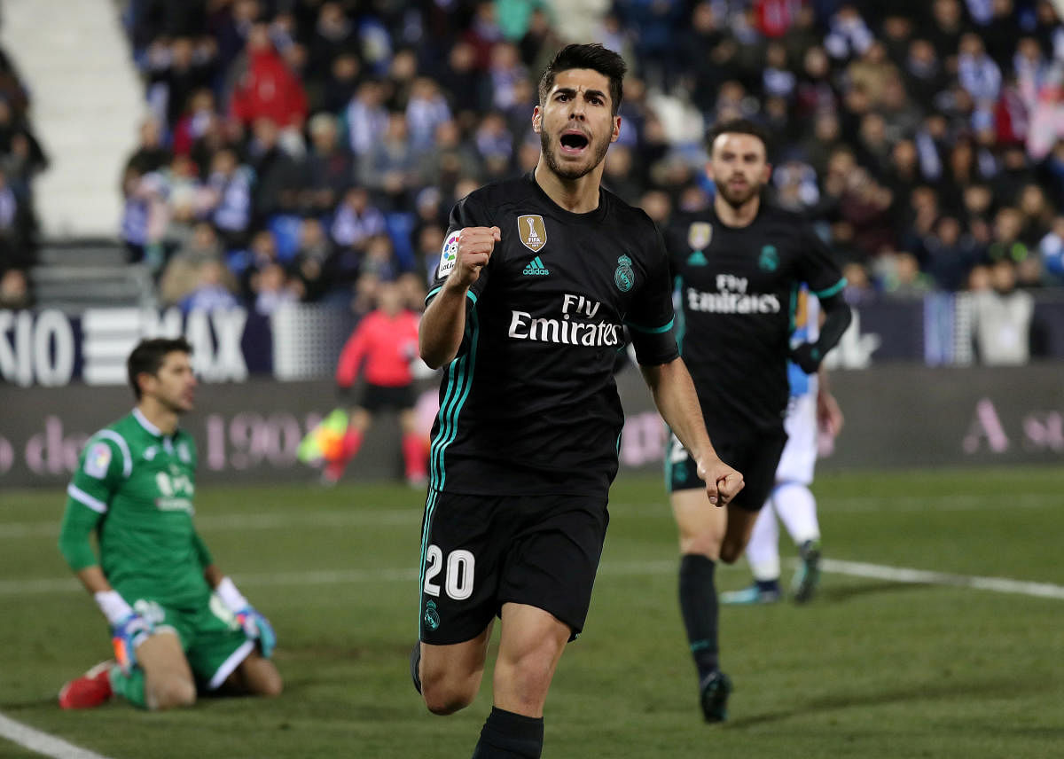 Real Madrid's Marco Asensio celebrates scoring against Leganes. Reuters