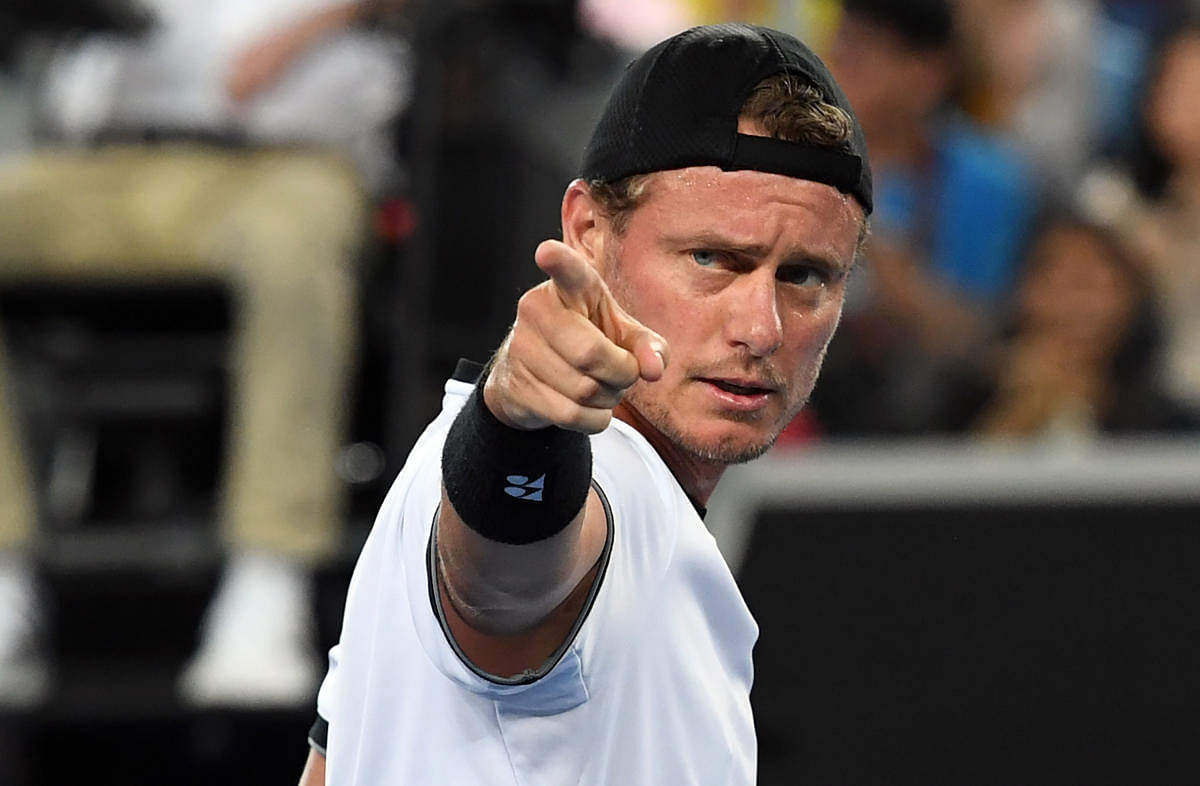 BACK TO THE FRONT Lleyton Hewitt, the man who exemplified the Australianfighting spirit, was known for wearing his cap backward for no apparent reason. AFP