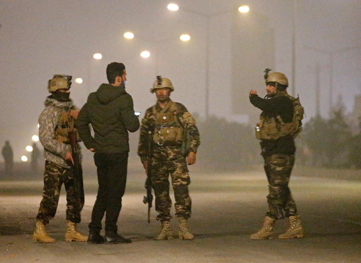 Afghan security force keep watch near the site of an attack on the Intercontinental Hotel in Kabul, Afghanistan. REUTERS