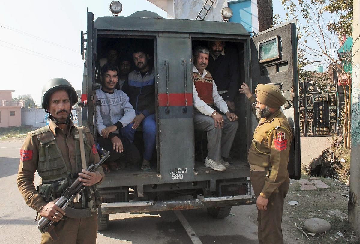 Villagers being evacuated by the Jammu and Kashmir Police personnel after heavy shelling by Pakistani forces on the border at Kanachak village, in Jammu on Saturday. PTI