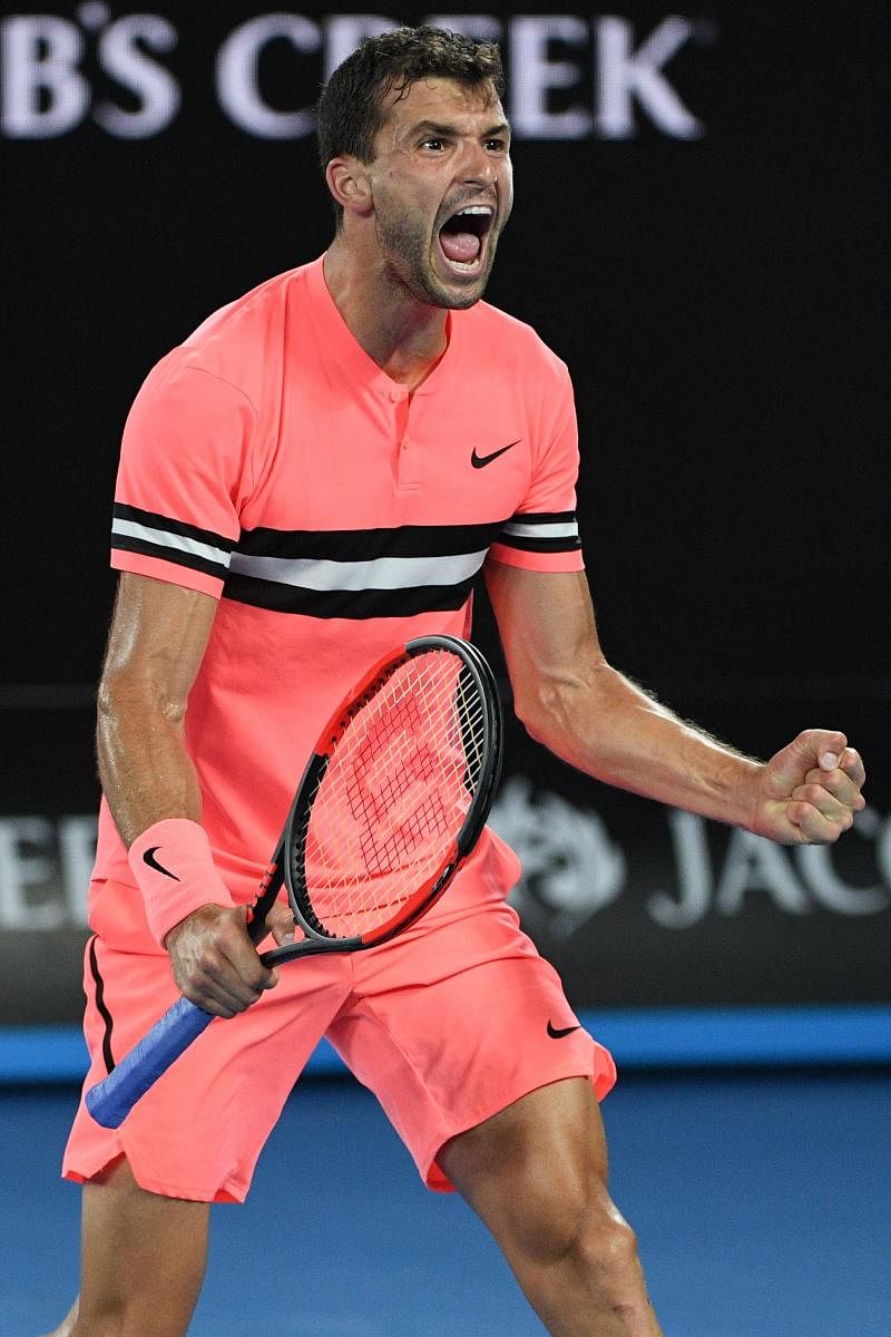 ECSTATIC: Bulgaria's Grigor Dimitrov celebrates after beating Australia's Nick Kyrgios in the fourth round of the Australian Open on Sunday. AFP