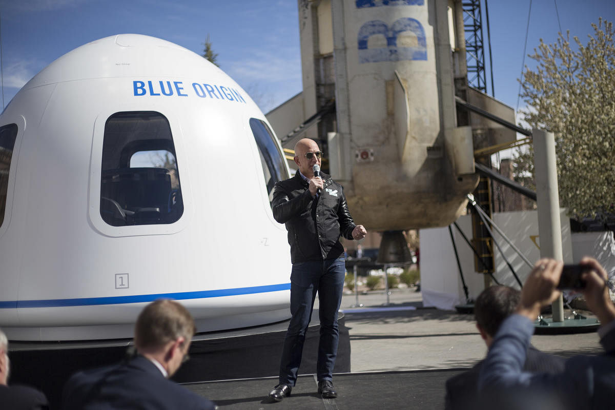Jeff Bezos, the founder of Amazon, discusses his Blue Origin reusable rocket system meant for low-orbit space tourism in Colorado Springs, Colo., April 5, 2017. Bezos, hopes the New Shepard can make the trip multiple times a day and pave the way for larger rockets and larger payloads. (Nick Cote/The New York Times)