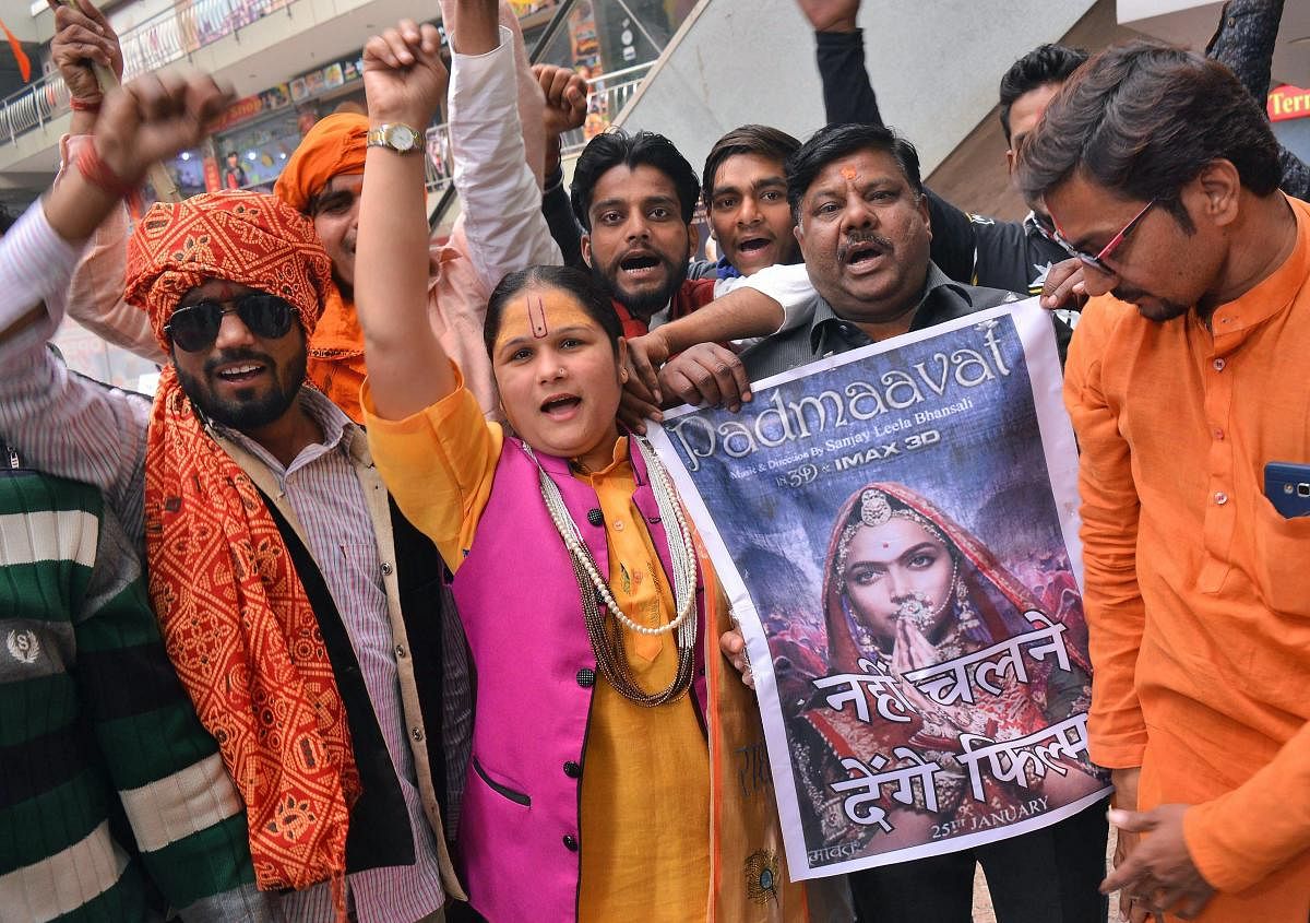 Rajput community people protest outside a cinema hall against the release of Bhansali's flim 'Padmaavat' in Mathura on Monday. PTI Photo