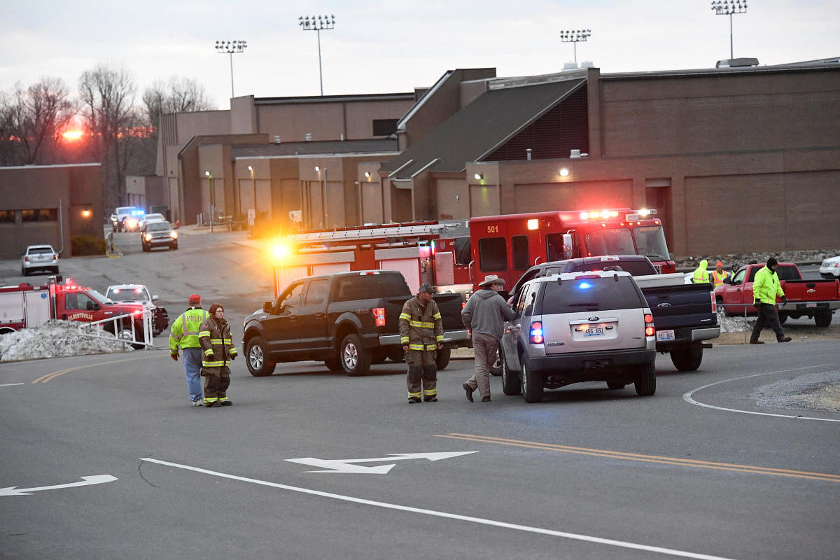 Police investigators are seen at the scene of a shooting at Marshall County High School in Benton, Kentucky, U.S., January 23, 2018.