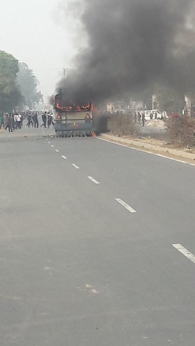 Mob set a bus on fire in Haryana.DH photo