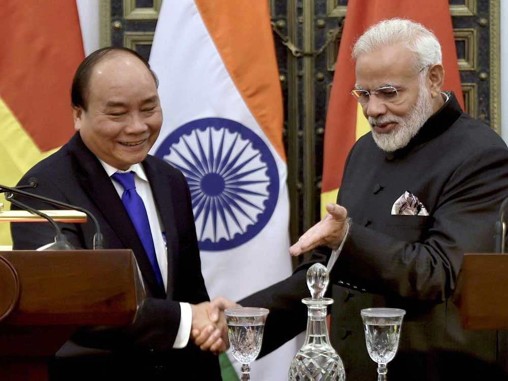 Prime Minister Narendra Modi and his Vietnamese counterpart, Nguyen Xuanphuc during a signing agreement between India and Vietnam at Hyderabad House in New Delhi on Wednesday. PTI