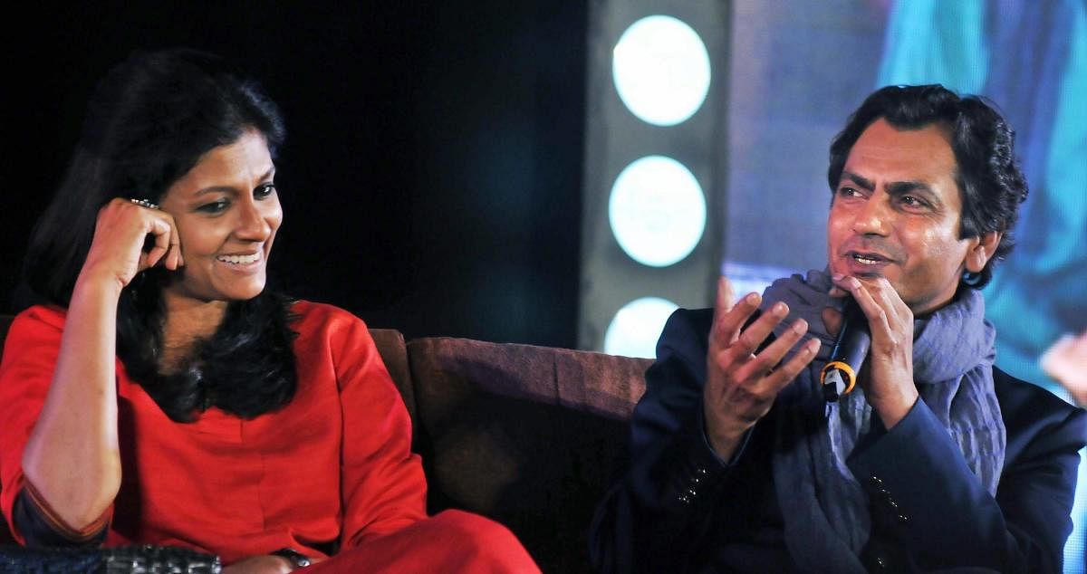 Bollywood actress and director Nandita Das with actor Nawazuddin Siddiqui having a conversation about their forthcoming biopic 'Manto' during the Tata Steel Kolkata Literary Meet-2018 at Victoria Memorial in Kolkata on Wednesday evening.PTI Photo