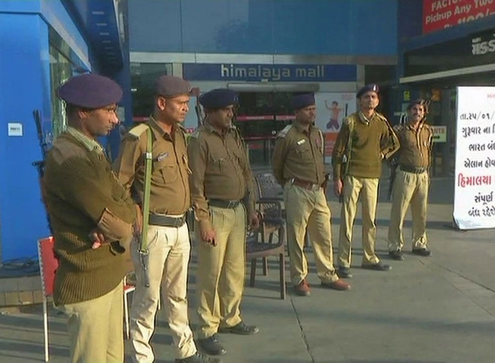 Police stationed outside a mall in Ahmedabad over protests against Padmaavat. ANI/twitter photo.