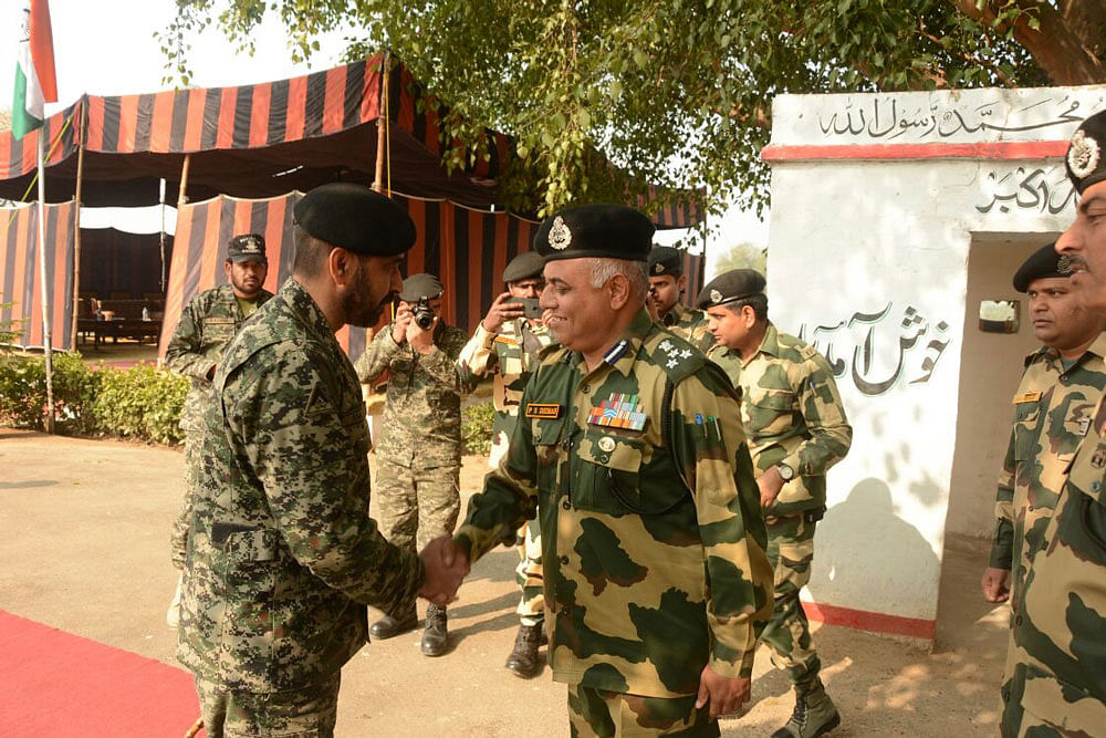 Members of the BSF and the Pakistani Rangers meet. Twitter photo.