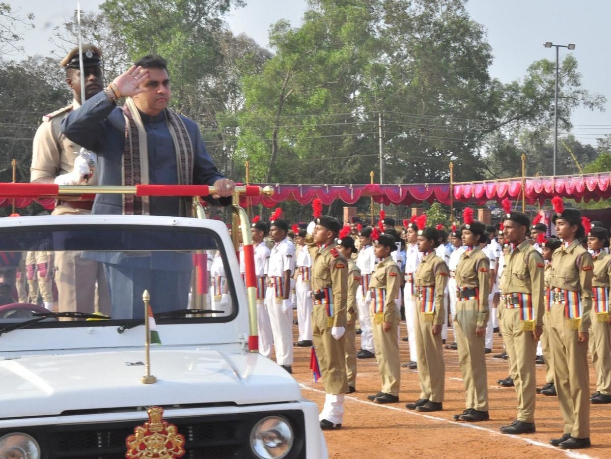 District-in-Charge Minister Pramod Madhwaraj receiving the guard of honour during Republic Day celebrations in Udupi on Friday.