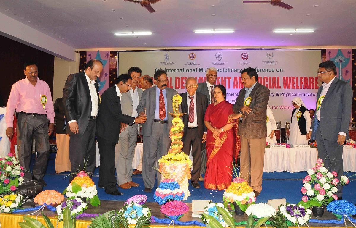 University of Mysore in-charge Vice Chancellor CBasavaraju inaugurates a symposium on 'Educational Development and Social Welfare', organised by UoM and Naresuan University, Netherlands, at St Philomena's First Grade College in Hassan on Saturday.
