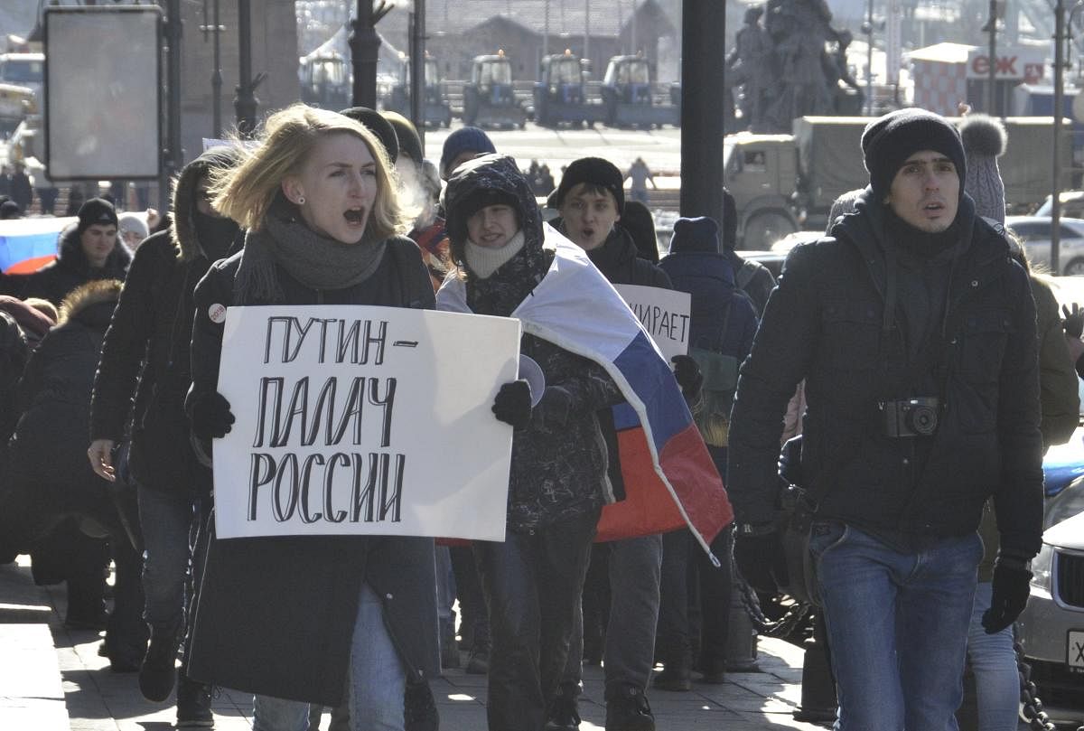 Supporters of Russian opposition leader Alexei Navalny take part in a procession during a rally for a boycott of a March 18 presidential election in Vladivostok, Russia, on Sunday. REUTERS