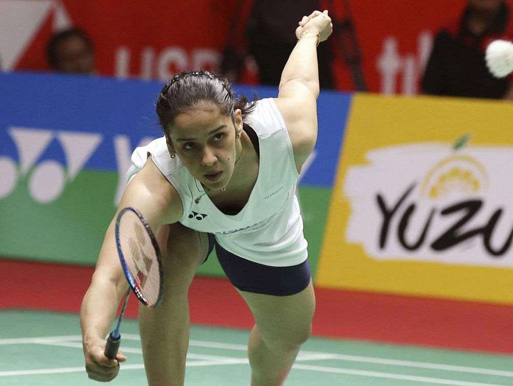Saina Nehwal plays against Taiwan's Tai Tzu Ying during the final round of the women's single match of the Indonesia Masters badminton tournament at Istora Stadium in Jakarta. AP/PTI photo.
