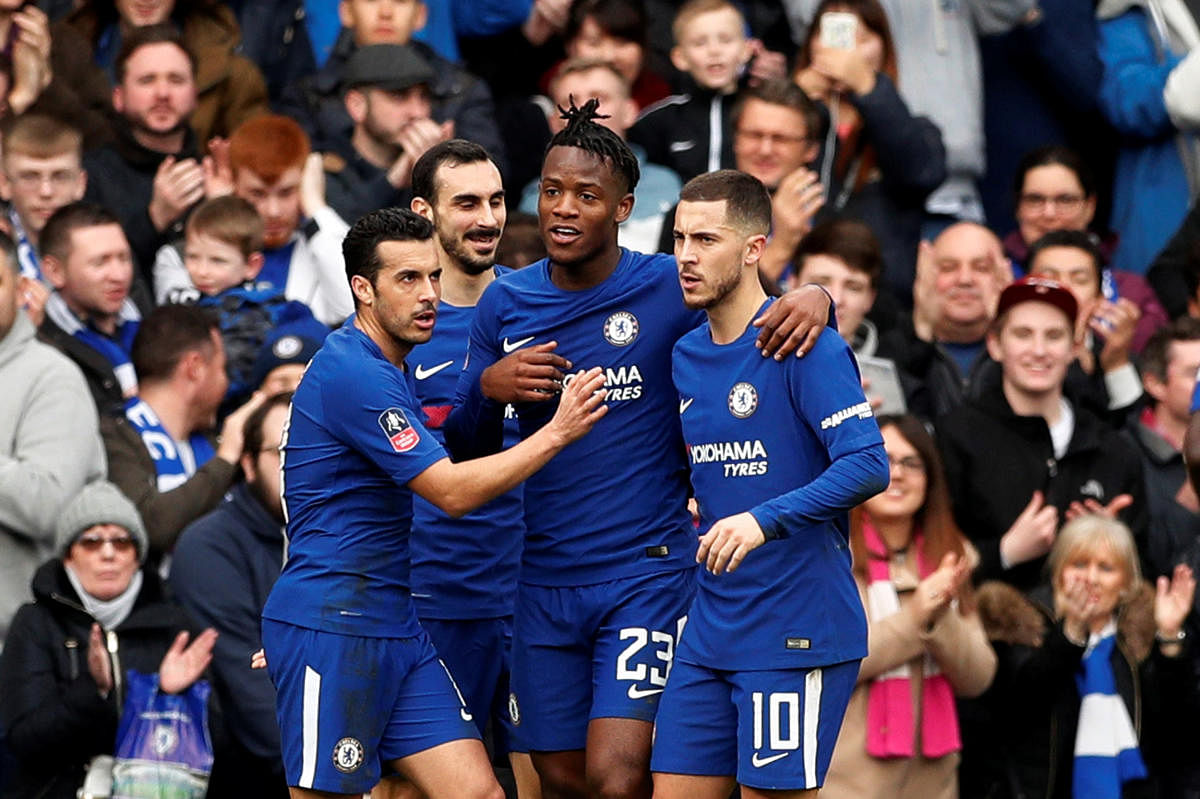 Chelsea's Michy Batshuayi (second from right) celebrates with team-mates after scoring against Newcastle United on Sunday, Reuters
