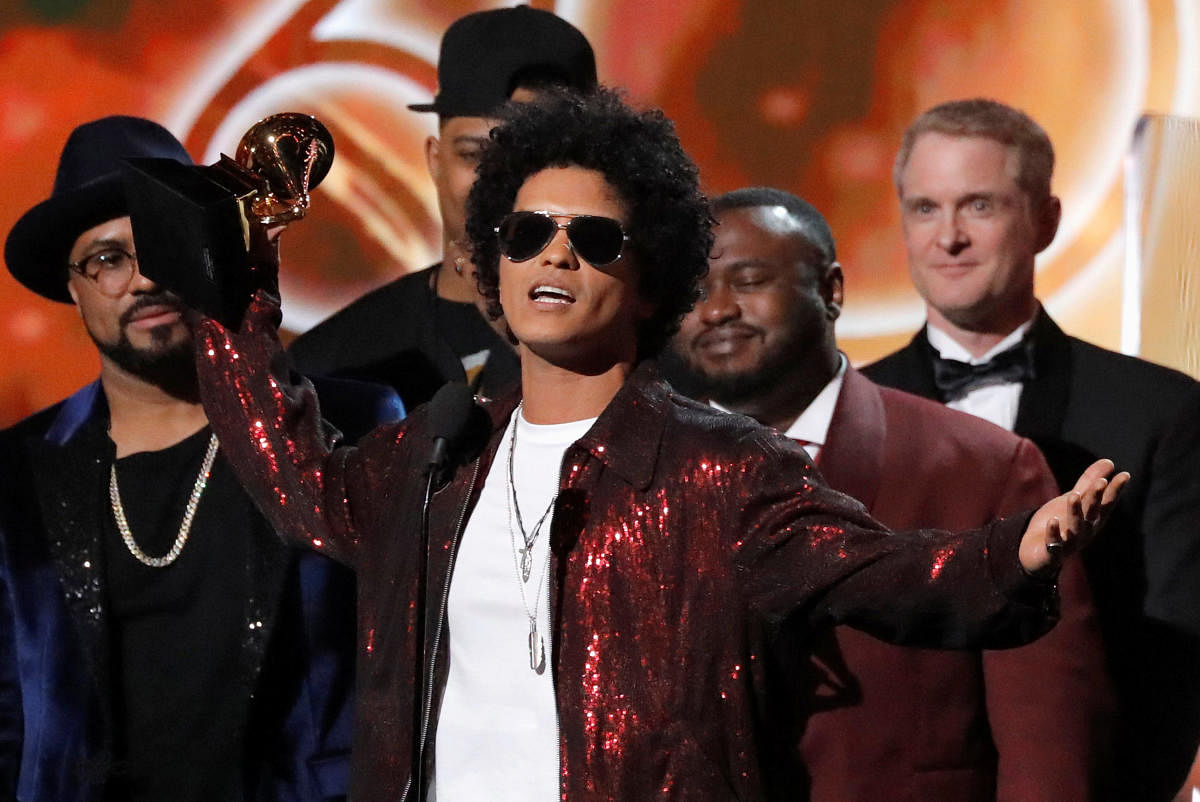 Bruno Mars accepts the Grammy for album of the year for 24K Magic.