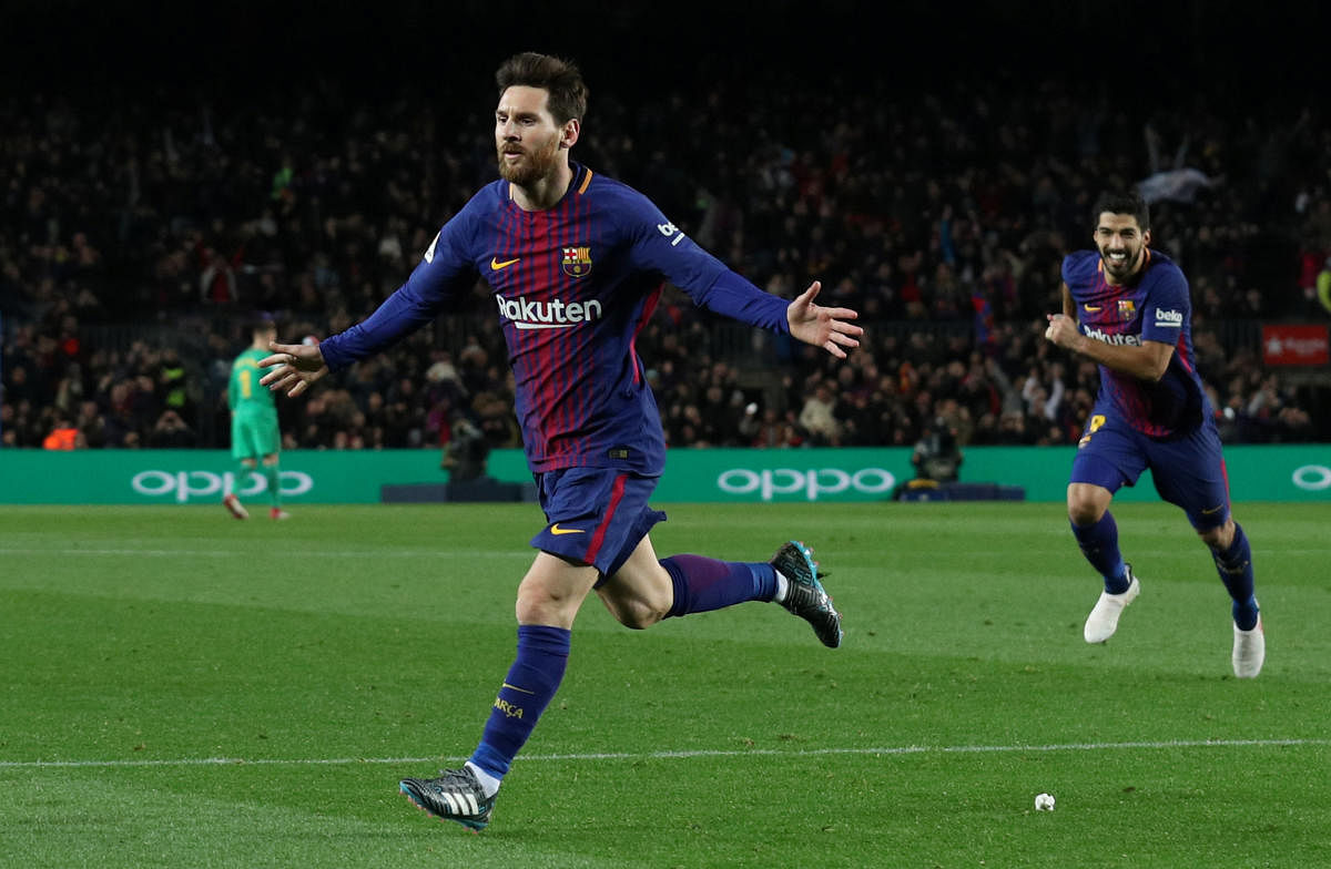 Barcelona's Lionel Messi celebrates scoring the winning goal against Alaves on Sunday. REUTERS