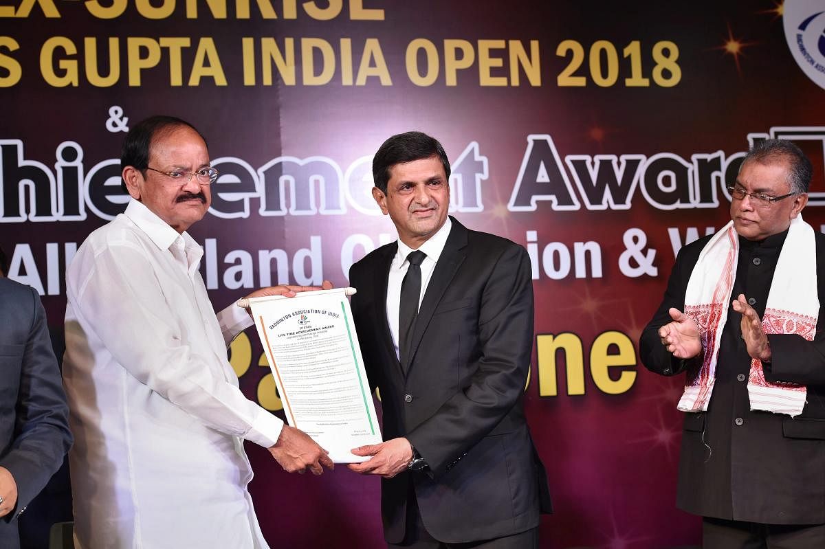 Vice President M Venkaiah Naidu presents BAI's Lifetime Achievement Award to Indian badminton legend Prakash Padukone in New Delhi on Monday. PTI