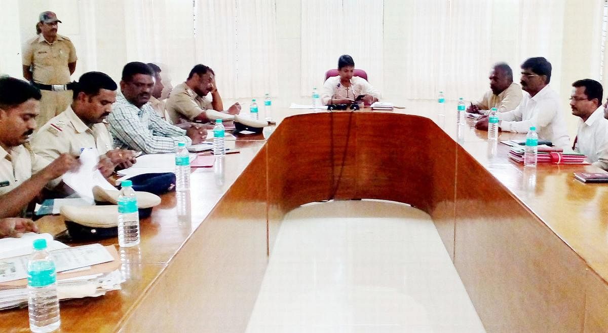 SP G Radhika chairs a high-level meeting, convene to discuss the security measures at KRS dam in Srirangapatna, Mandya district on Monday.