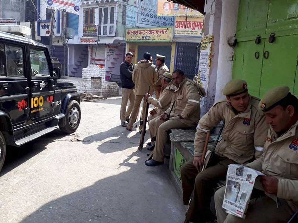 More than 80 persons were arrested while Rapid Action Force (RAF) and Provincial Armed Constabulary (PAC) personnel intensified vigil in Kasganj on Sunday. PTI Photo