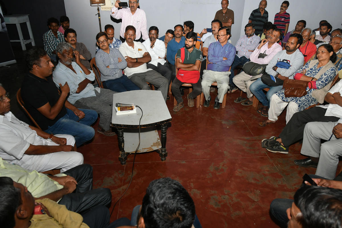 Actor Prakash Rai speaks at an interaction programme, at Rangayana in Mysuru on Tuesday. Writers Pa Mallesh and Devanuru Mahadeva and professor Muzafar Assadi are seen.